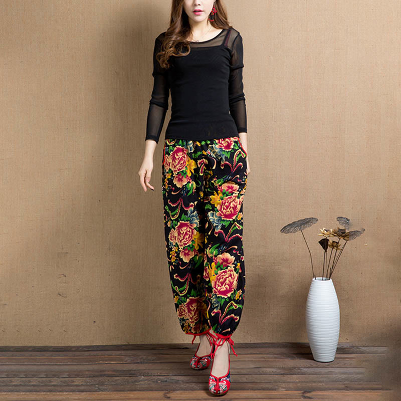 Pantalones bombachos con estampado de flores rojas y verdes de estilo étnico con Buddha Stones y bolsillos