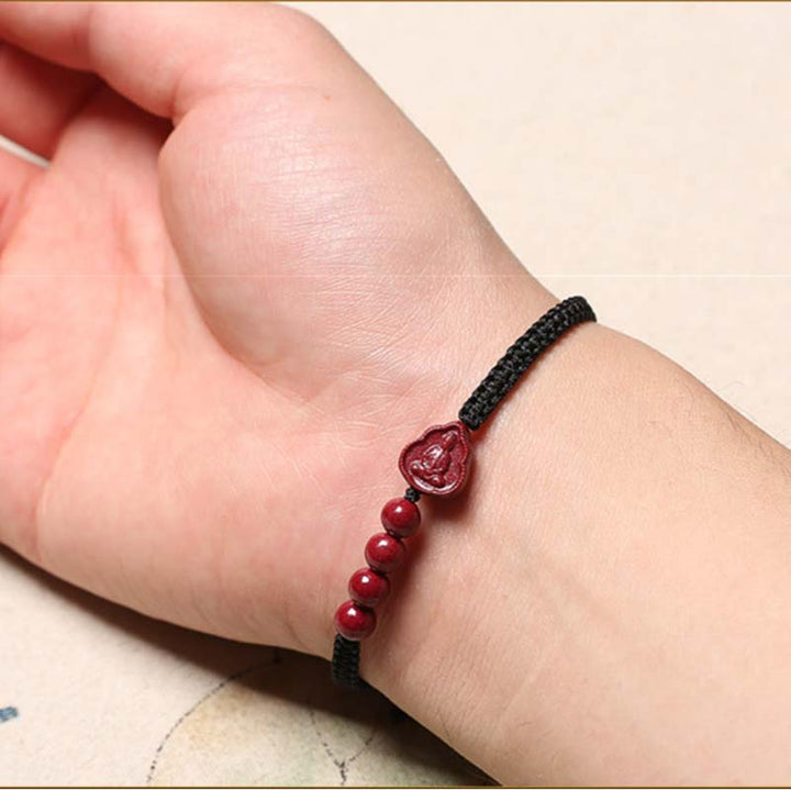 Pulsera de cuerda de bendición de cinabrio de Avalokitesvara de Buda sonriente con Buddha Stones