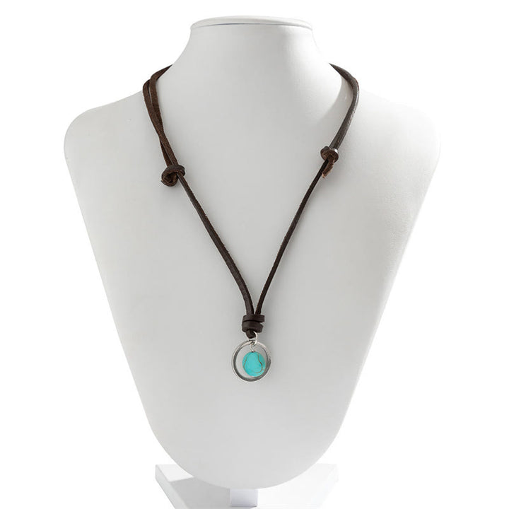 Colgante de collar de fuerza de protección de piedra turquesa redonda de Buddha Stones