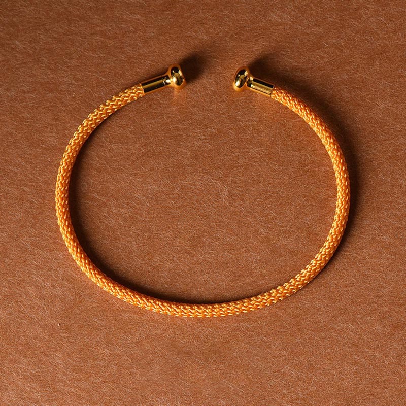 Pulsera de cuerda trenzada de la suerte hecha a mano con diseño simple de Buddha Stones