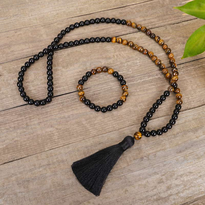 Juego de collar de protección de ojo de tigre de ónix negro tibetano con Buddha Stones