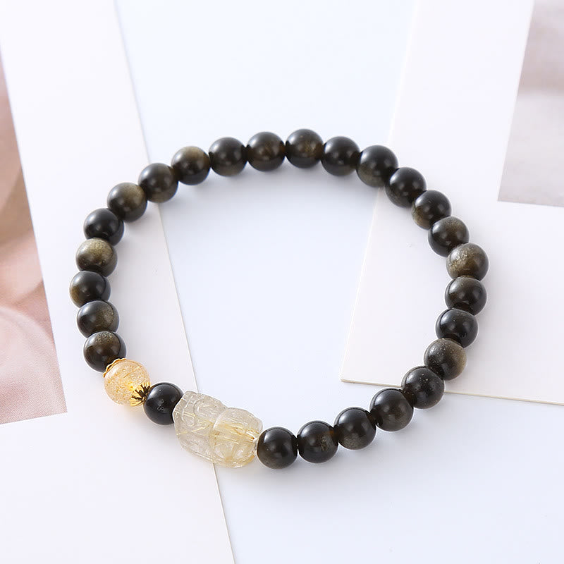 Pulsera de protección de la riqueza PiXiu de obsidiana con brillo de oro natural de Buddha Stones - PiXiu de obsidiana con brillo dorado - image 1
