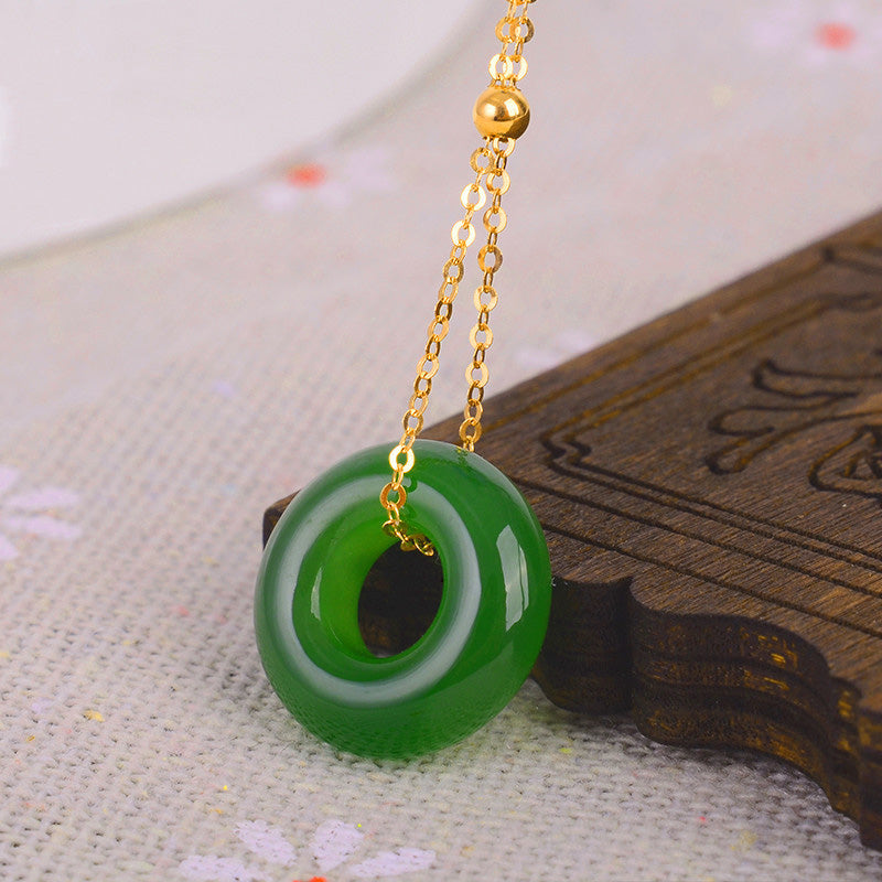 Colgante de collar de oro de 14 quilates curativo de jade cian redondo