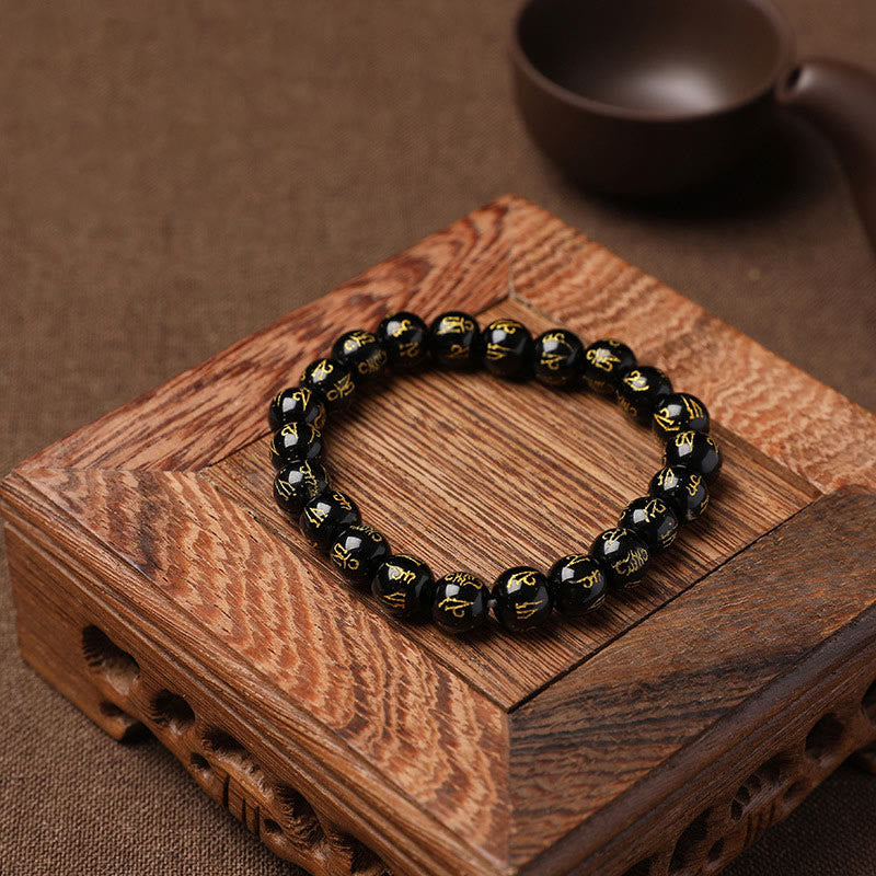 Pulsera de meditación Om Mani Padme Hum de ónix negro y cristal blanco del Tíbet con Buddha Stones