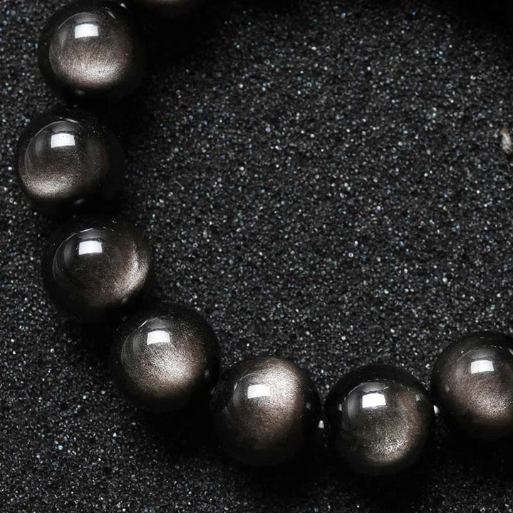 Pulsera de protección calmante de obsidiana brillante de plata natural con Buddha Stones