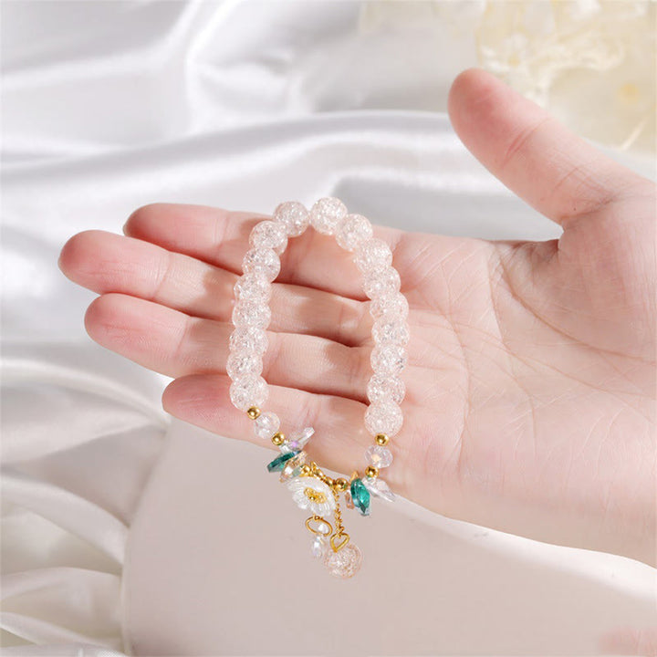 Pulsera de cuentas de cristal con dije de flor de diseño simple con Buddha Stones