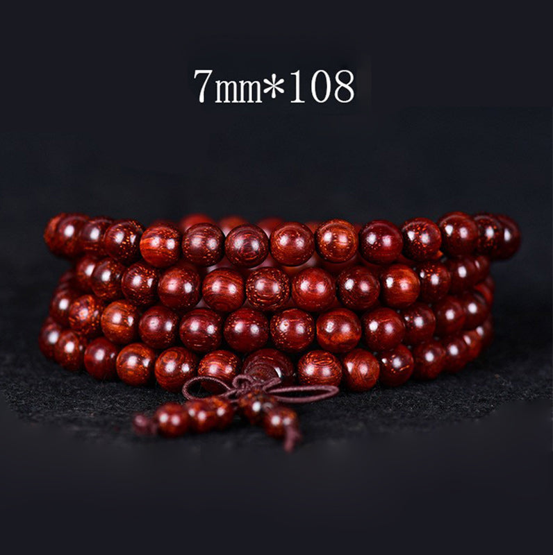 Pulsera de equilibrio de sándalo rojo con hoja pequeña tibetana de Buddha Stones