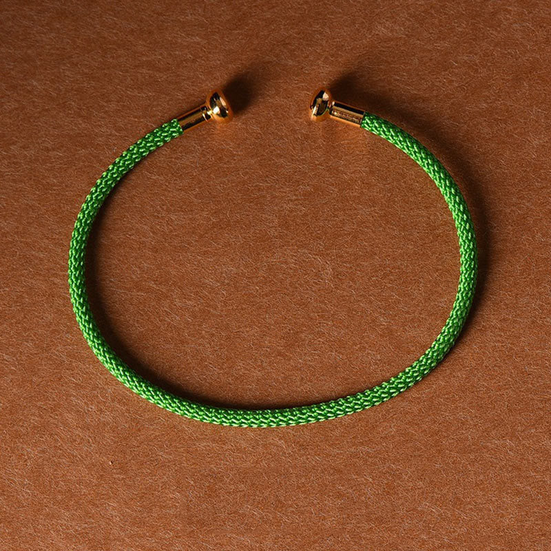 Pulsera de cuerda trenzada de la suerte hecha a mano con diseño simple de Buddha Stones