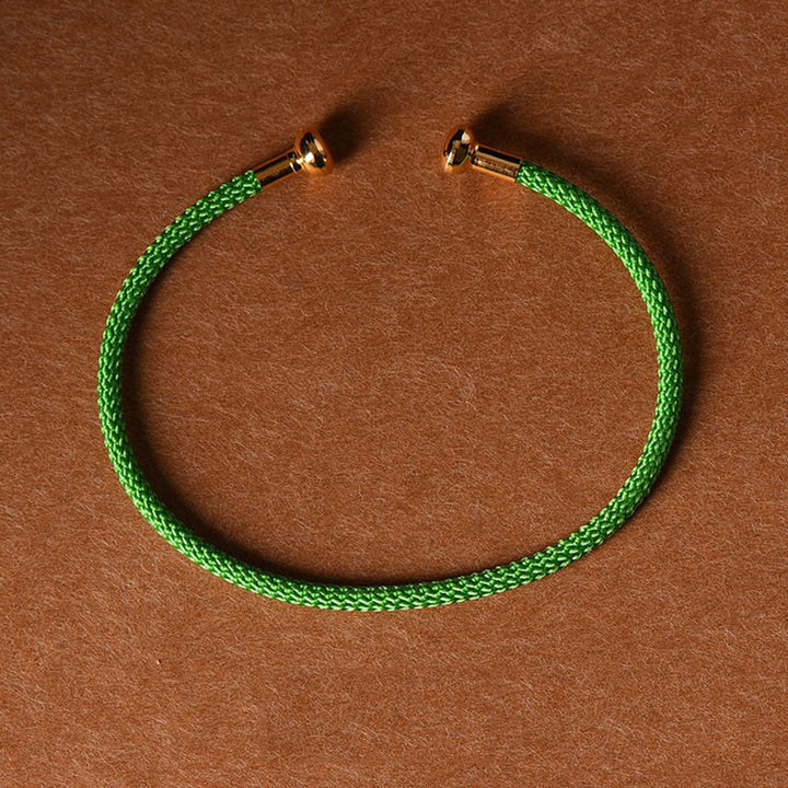 Pulsera de cuerda trenzada de la suerte hecha a mano con diseño simple de Buddha Stones