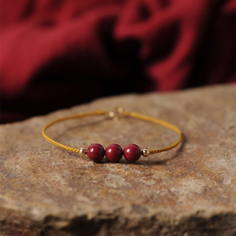 Pulsera trenzada con cadena de bendición de cinabrio natural chapada en oro de 14 quilates con Buddha Stones