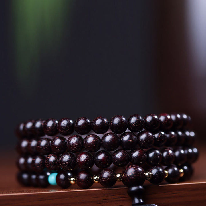Buddha Stones 108 cuentas Mala tibetanas hoja pequeña sándalo rojo pulsera de equilibrio de loto