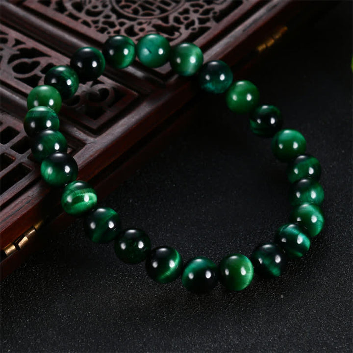 Pulsera de fuerza de ojo de tigre verde natural con Buddha Stones - image 1
