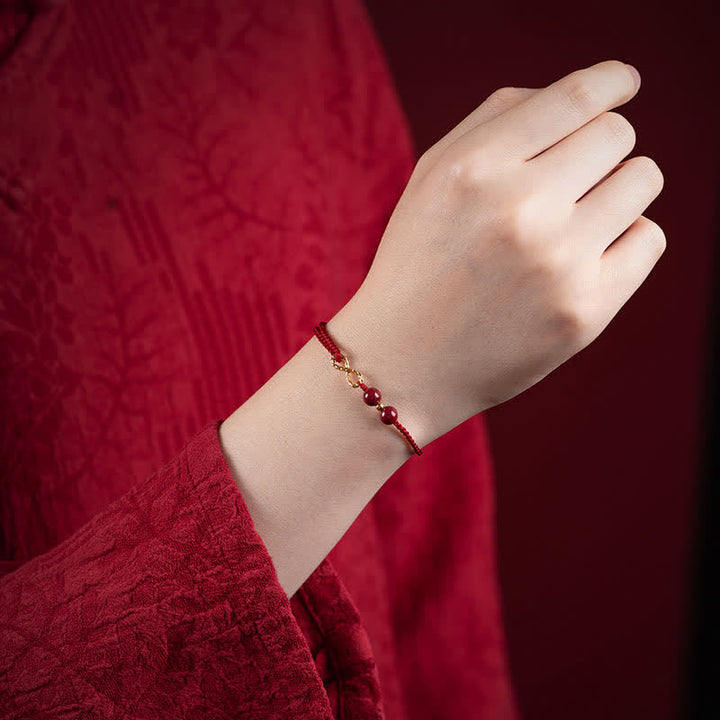 Pulsera tobillera con símbolo del infinito de oro de 14 quilates con hilo rojo y bendición de cinabrio con Buddha Stones