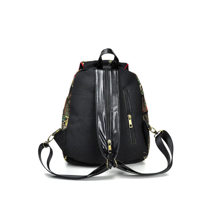 Mochila con borlas de lona con bordado de pavo real