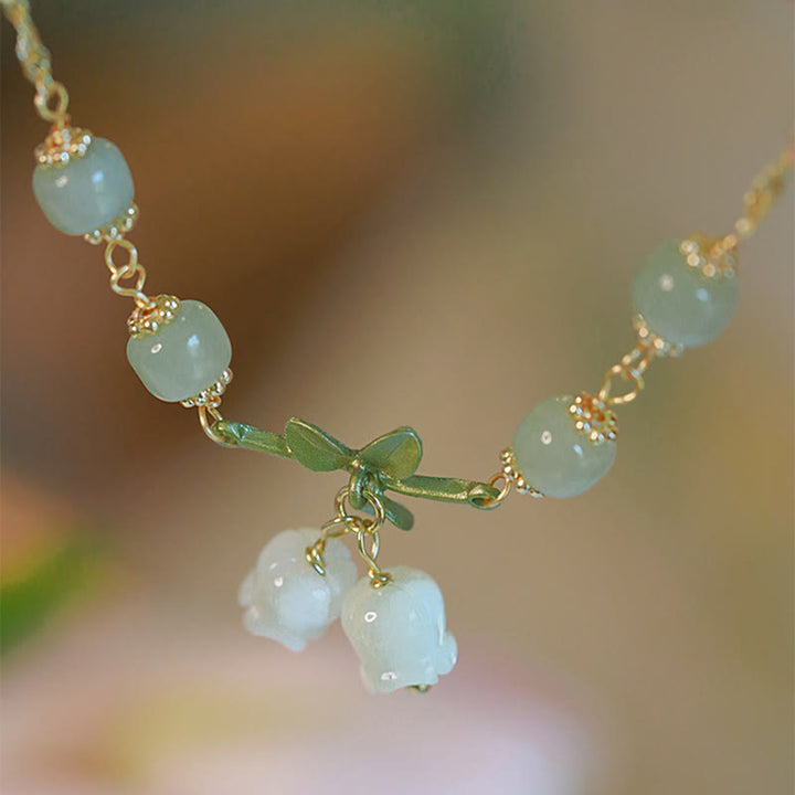 Pulsera de cadena de prosperidad de lirio de los valles con cuentas de jade verde y Buddha Stones