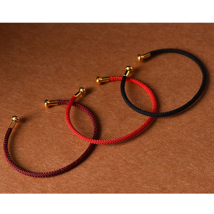 Pulsera de cuerda trenzada de la suerte hecha a mano con diseño simple de Buddha Stones