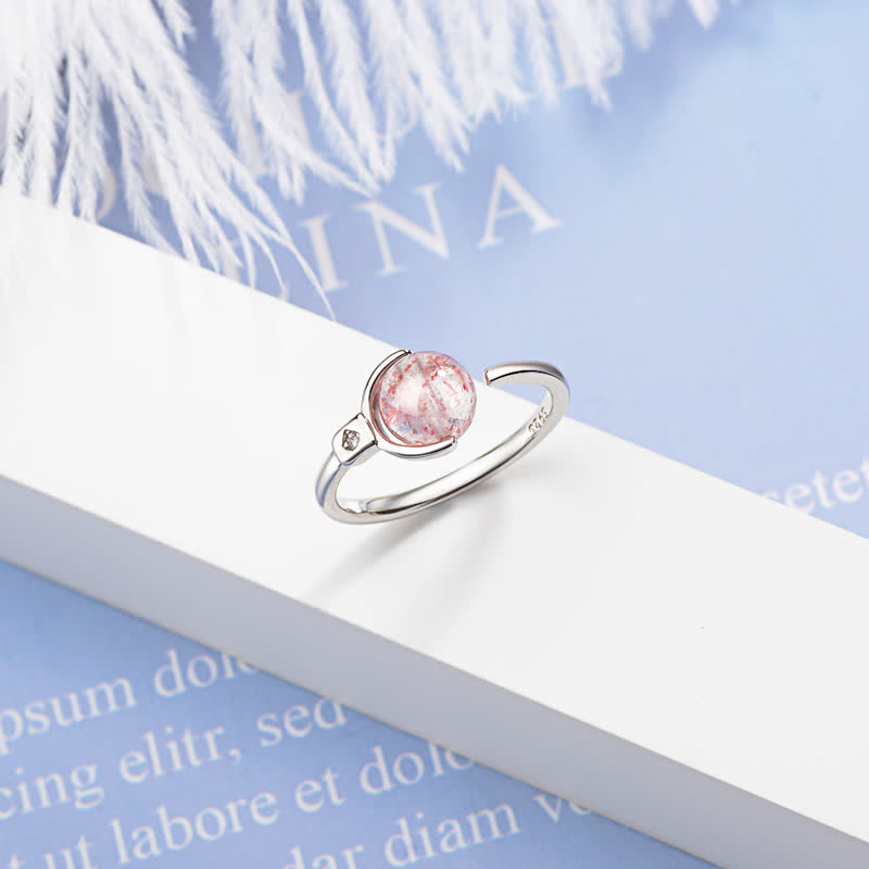Anillo de rotación calmante de cristal rosa con Buddha Stones