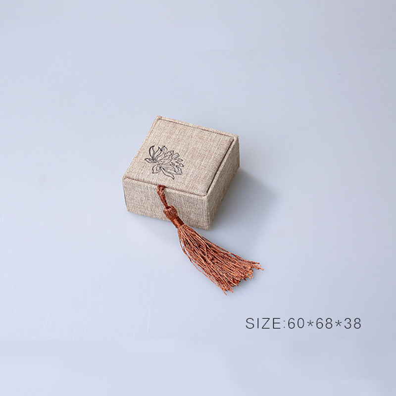 Caja de almacenamiento de joyería con diseño de loto y Buddha Stones, caja de regalo con borlas