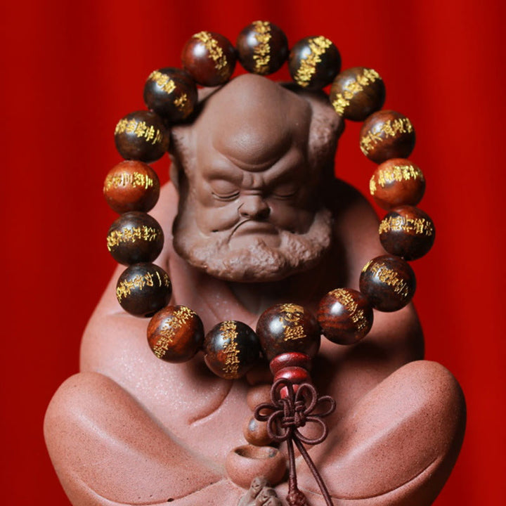 Pulsera de curación grabada con sutra de corazón de palisandro tibetano