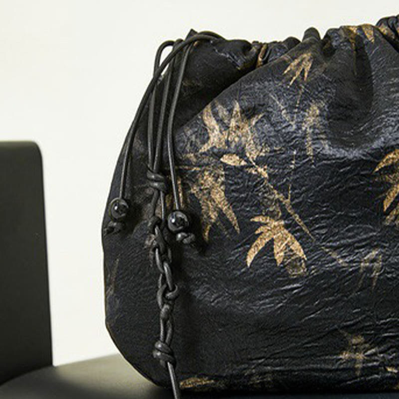 Bolso bandolera de acetato con estampado de hojas de bambú amarillo con Buddha Stones