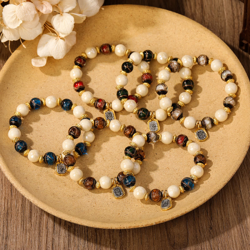 Buddha Stones tibetano Zakiram diosa de la riqueza encanto Liuli vidrio incienso ceniza porcelana pulsera de protección de cuentas