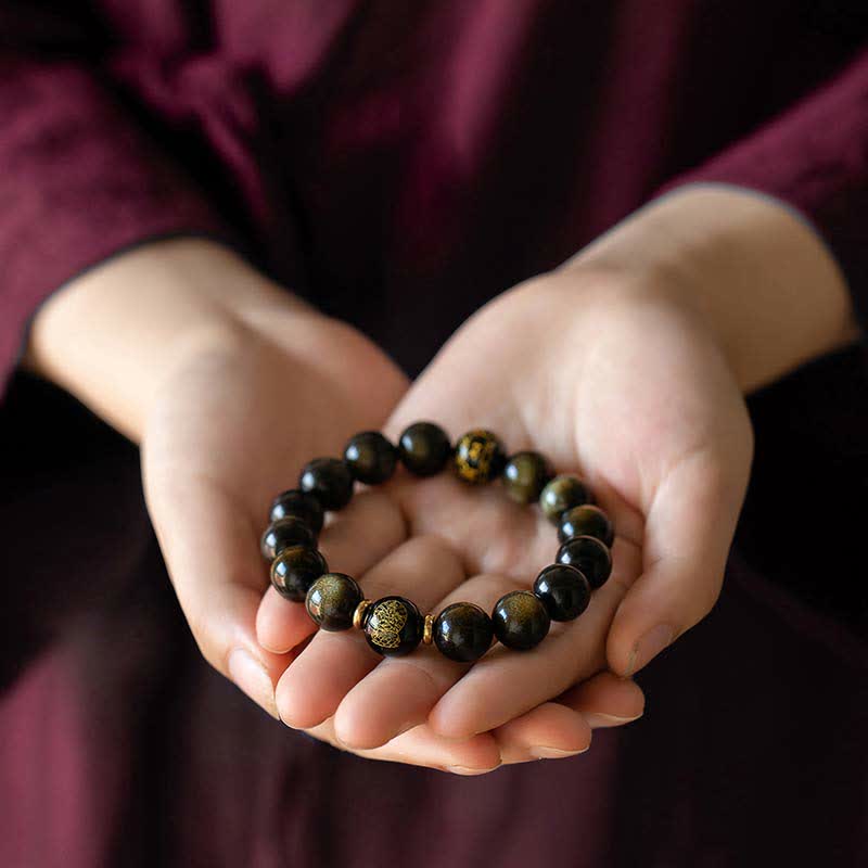 Pulsera de protección de la riqueza de obsidiana con brillo dorado del Buda Natal del zodíaco chino