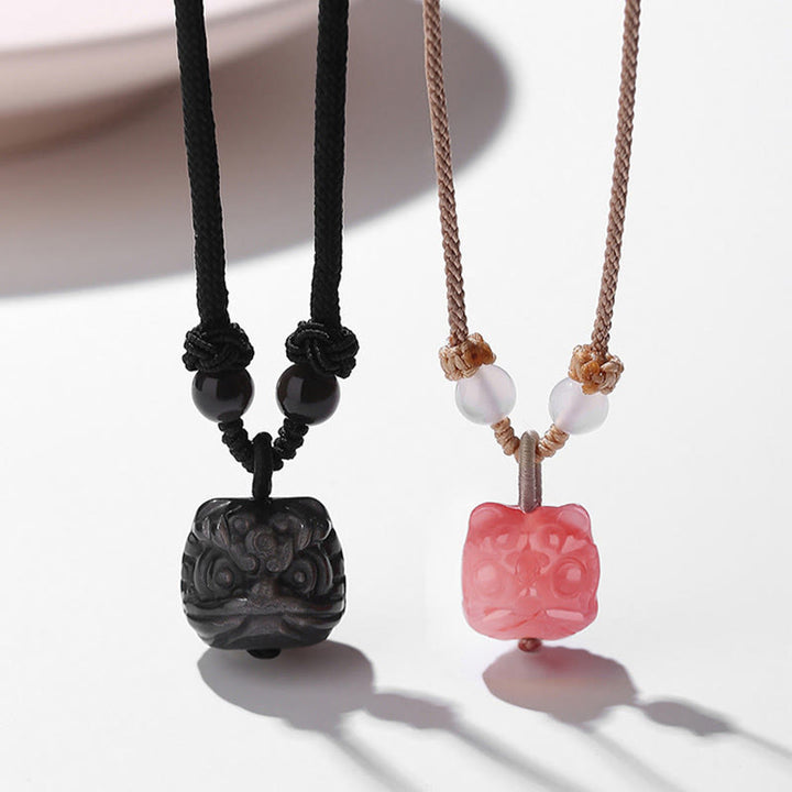 Collar con colgante de protección de León danzante de ágata roja obsidiana con brillo de plata Natural con Buddha Stones