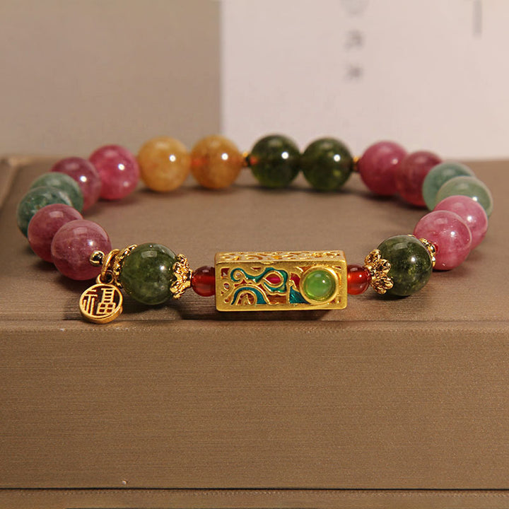 Pulsera con dije de personaje Fu positivo de turmalina colorida con Buddha Stones