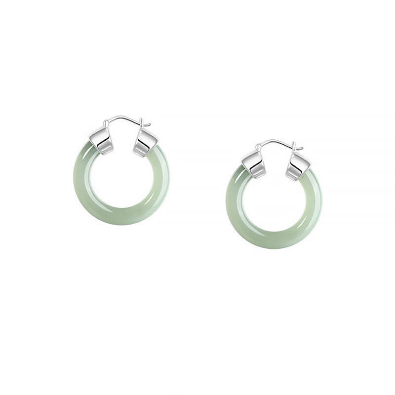 Pendientes de prosperidad de jade blanco redondo de Buddha Stones