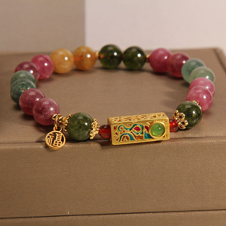 Pulsera con dije de personaje Fu positivo de turmalina colorida con Buddha Stones