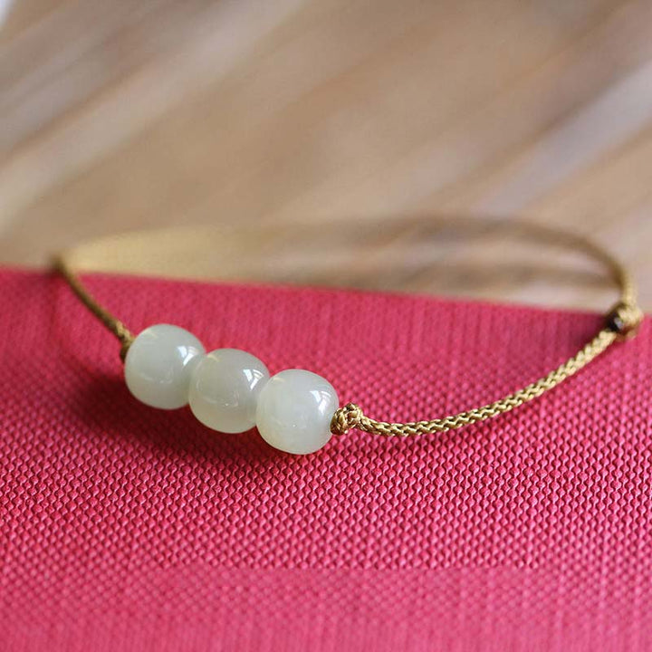 Pulsera de tejido de hilo de la suerte de jade con tres cuentas de piedras de Buddha Stones
