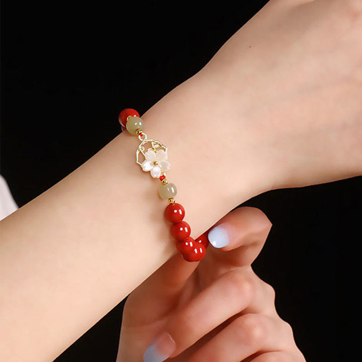 Pulsera de bendición de flores de piedra Tridacna con cuentas de jade cinabrio Natural de Buddha Stones