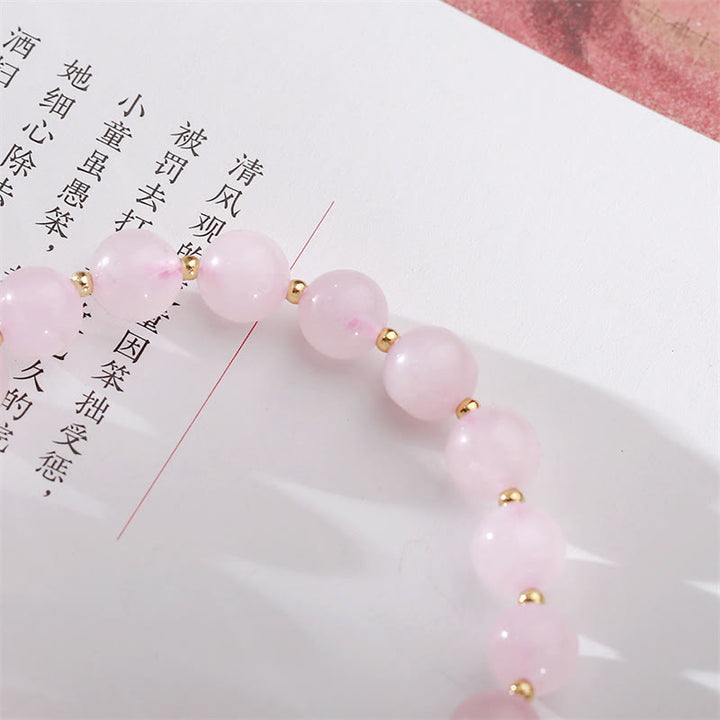 Pulsera de amor de flor de ciruelo de cristal rosa natural