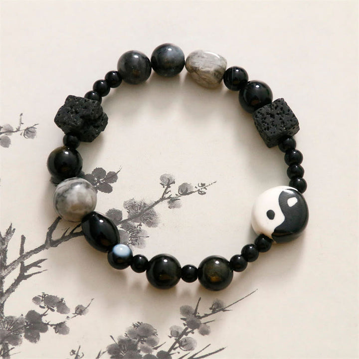 Pulsera de protección de la fortuna Yin Yang con cuentas de jaspe Picasso de ónix negro y Buddha Stones