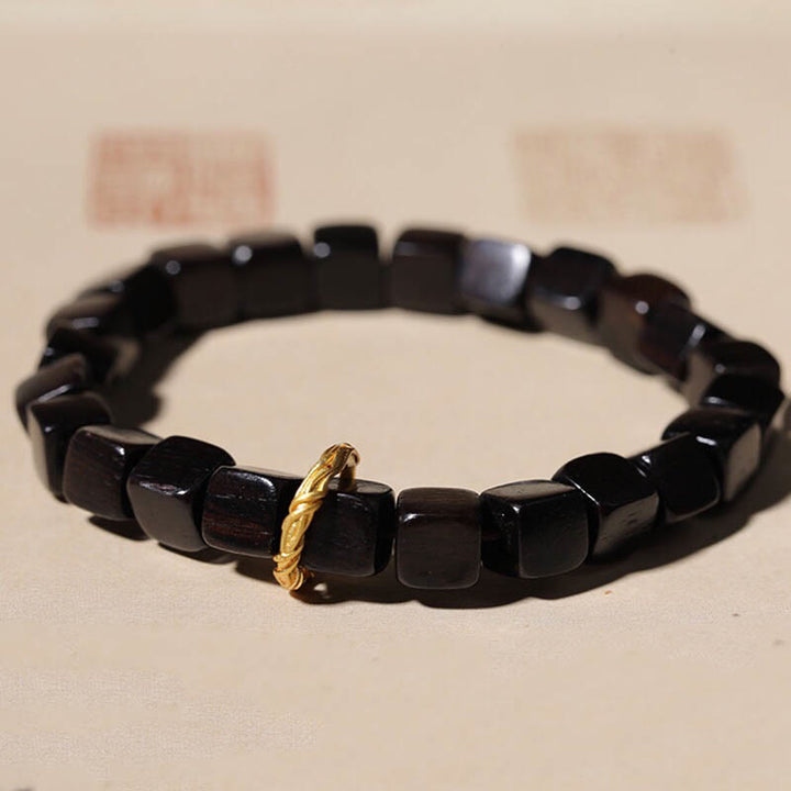 Pulsera de paz y calma con cuentas cuadradas de madera de ébano tibetano con Buddha Stones