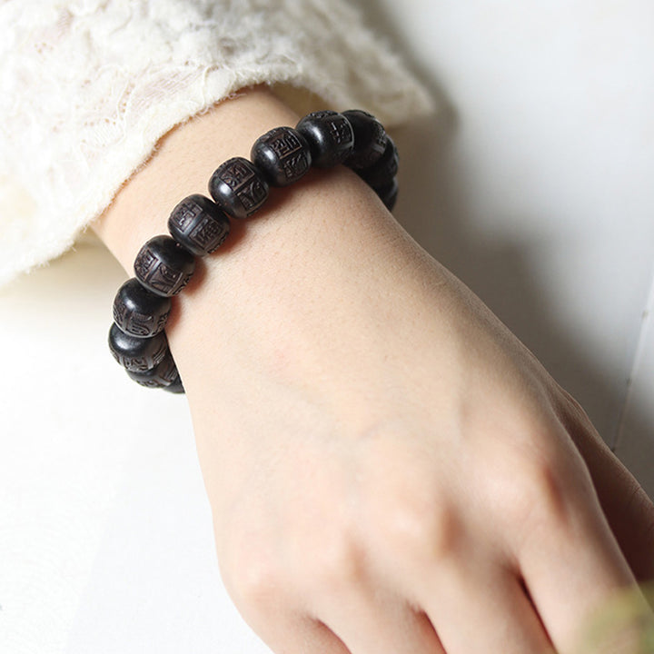 Pulsera de equilibrio grabada con Buddha Stones , madera de ébano del Tíbet, Om Mani Padme Hum