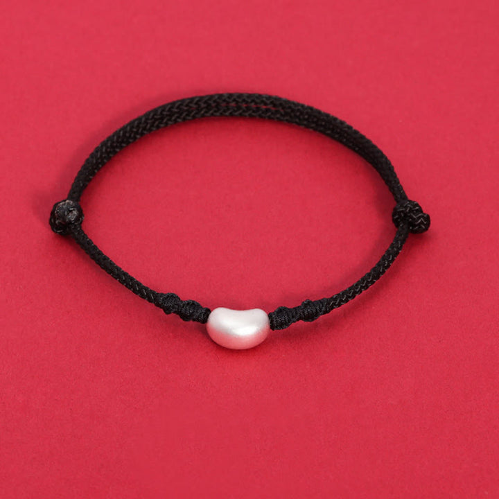 Pulsera trenzada hecha a mano con diseño de frijol de plata de ley 999 con Buddha Stones
