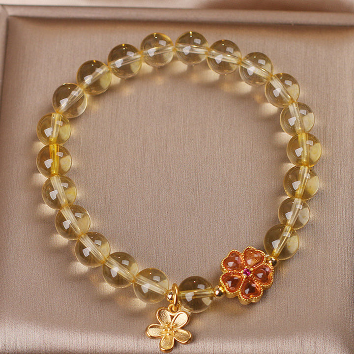 Pulsera de protección de prosperidad con dije de flor de citrino natural con Buddha Stones