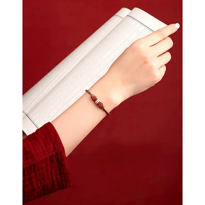 Pulsera de hilo trenzado de la suerte de color Dunhuang hecha a mano con Buddha Stones
