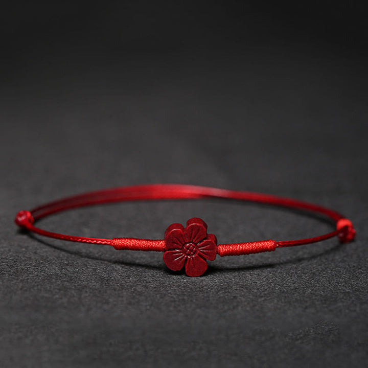 Pulsera trenzada hecha a mano con Buddha Stones, flor de ciruelo, trébol de cuatro hojas, PiXiu, loto, pez Koi, cinabrio