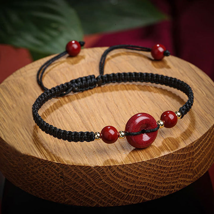 Pulsera de cuerda de bendición con hebilla de paz de cinabrio natural con Buddha Stones