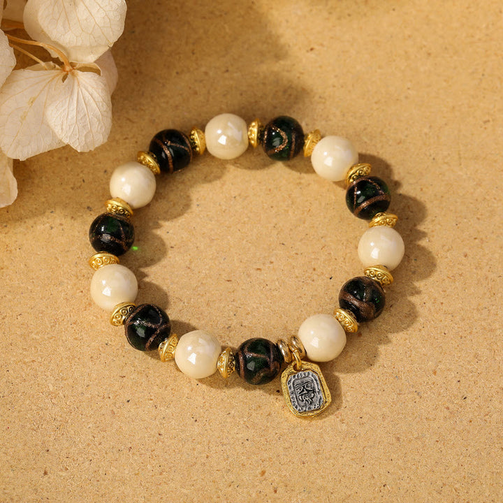 Buddha Stones tibetano Zakiram diosa de la riqueza encanto Liuli vidrio incienso ceniza porcelana pulsera de protección de cuentas