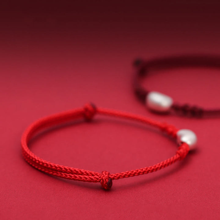 Pulsera trenzada hecha a mano con diseño de frijol de plata de ley 999 con Buddha Stones