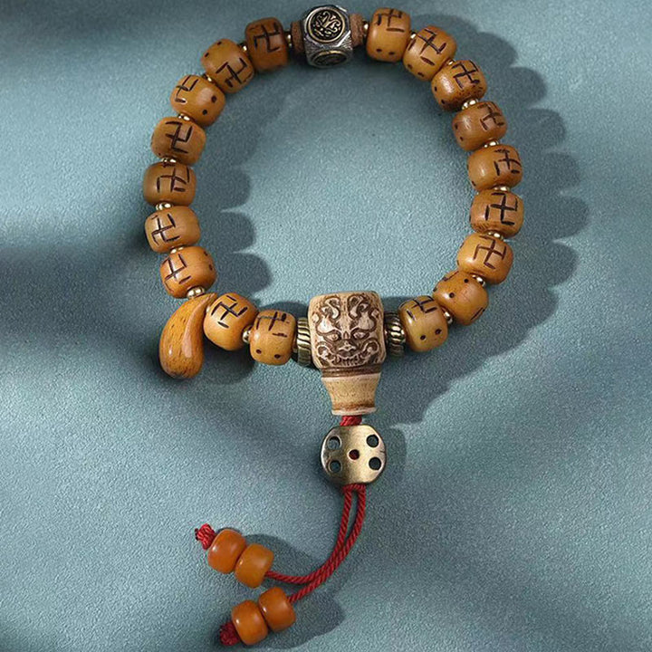 Buddha Stones, hueso de camello tibetano Natural, esvástica, cuentas Dzi, amuleto de Buda Shankha, Kirtimukha, pulsera con borla de protección de la suerte