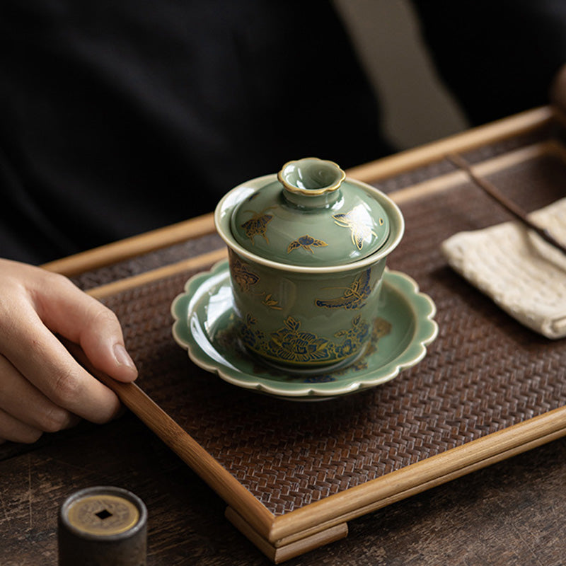 Buddha Stones de porcelana verde, mariposa, flor, salmón, pescado, cerámica, Gaiwan Sancai, taza de té de Kung Fu y platillo con tapa