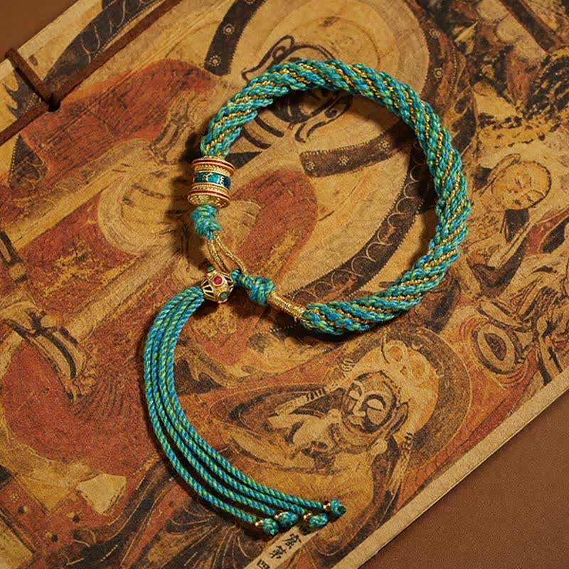 Pulsera de cuerda tejida con dije de rueda de oración Thangka de la suerte hecha a mano tibetana con Buddha Stones