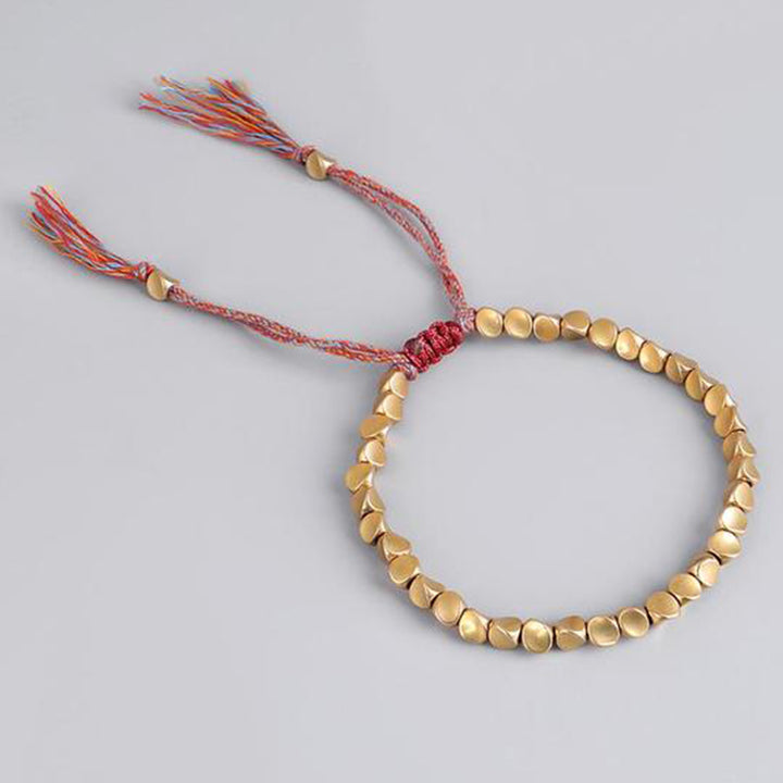 Pulsera de la suerte curativa con cuentas de cobre tibetanas de Buddha Stones