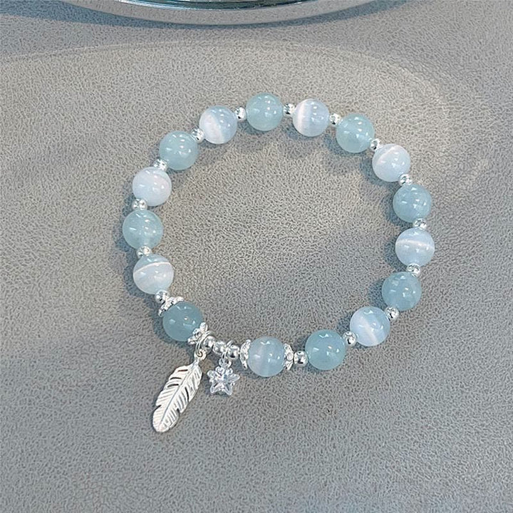 Pulsera con dije de estrella y plumas curativas de ojo de gato, aguamarina, plata de ley 925 con Buddha Stones - Aguamarina y ojo de gato en plata de ley 925 (circunferencia de muñeca: 14-16 cm) - image 0