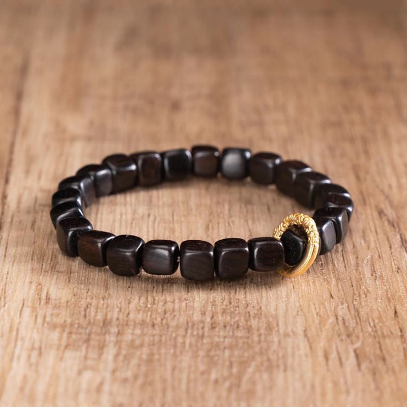 Pulsera de equilibrio de cuentas Dzi de madera de ébano tibetano con Buddha Stones