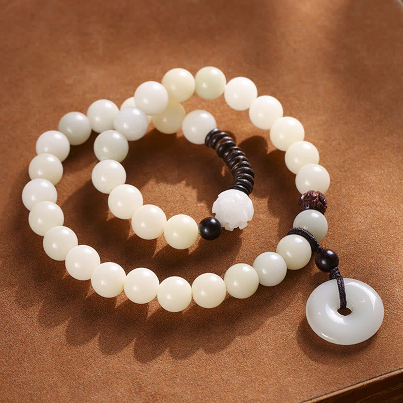 Pulsera de doble envoltura con hebilla de paz y loto de sándalo verde, semilla de Bodhi, Buddha Stones, armonía